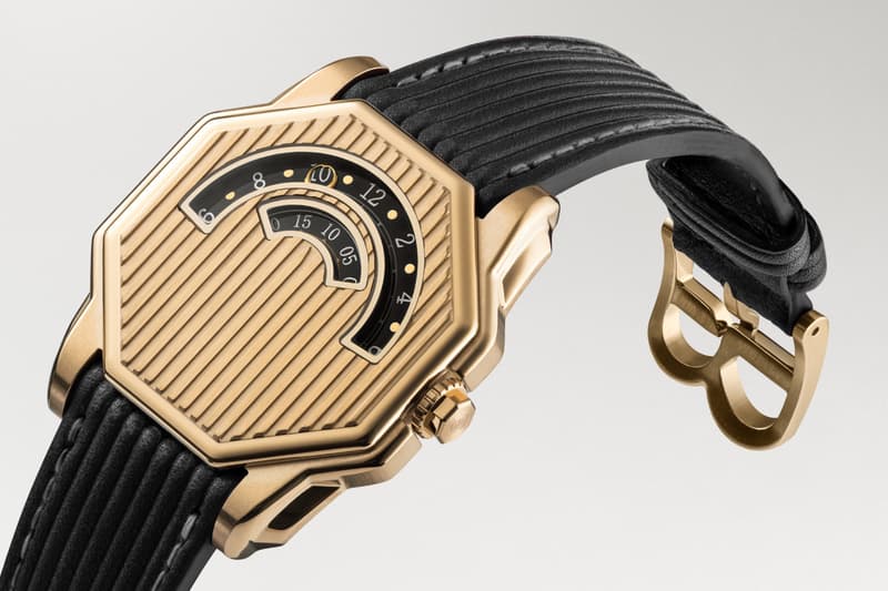 Montre en or design unique avec bracelet noir